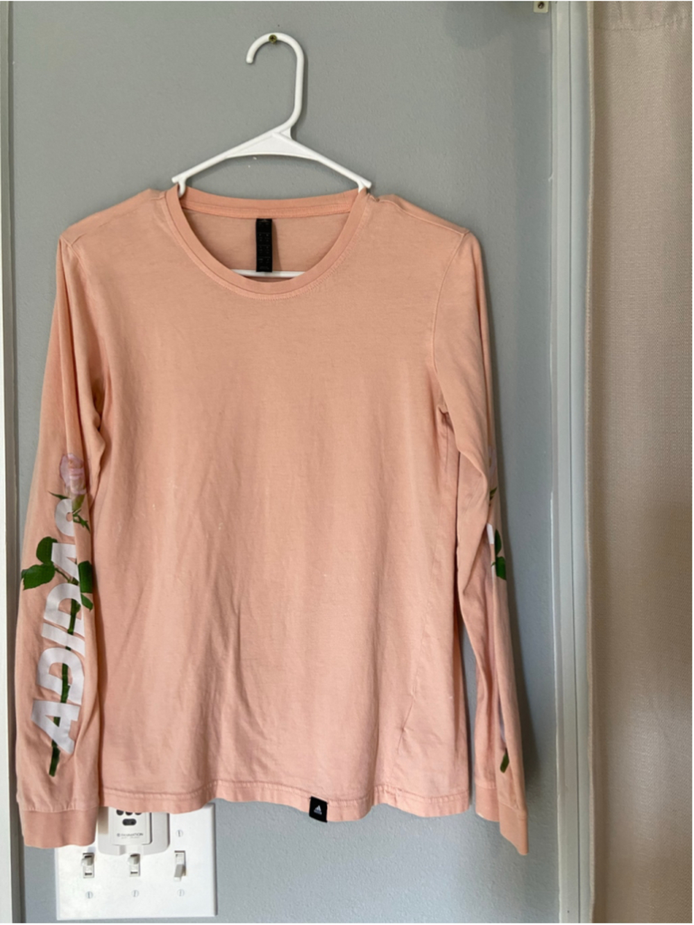 Long sleeve Adidas tshirt , peach, with floral Adidas logo on sleeves Size small
